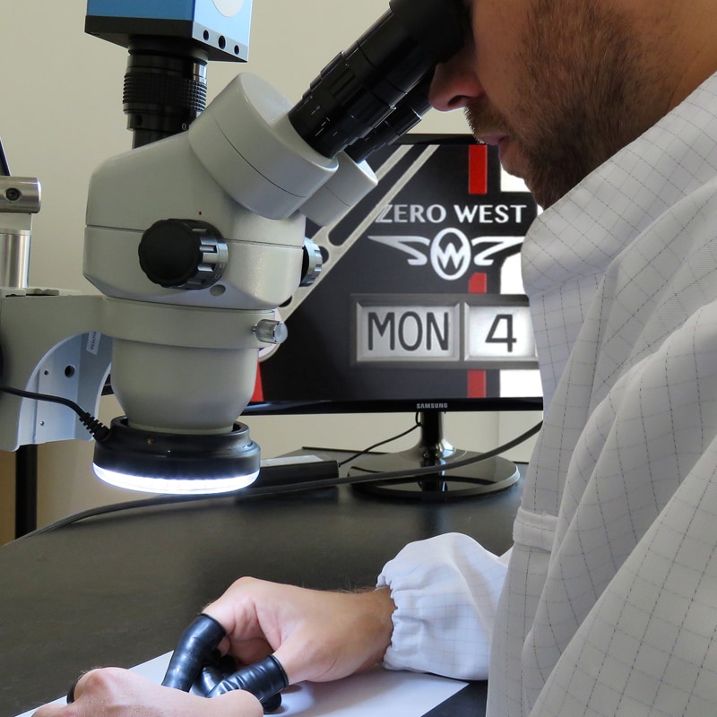 Man looking through a microscope