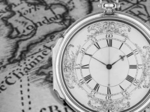 Vintage stop watch on map