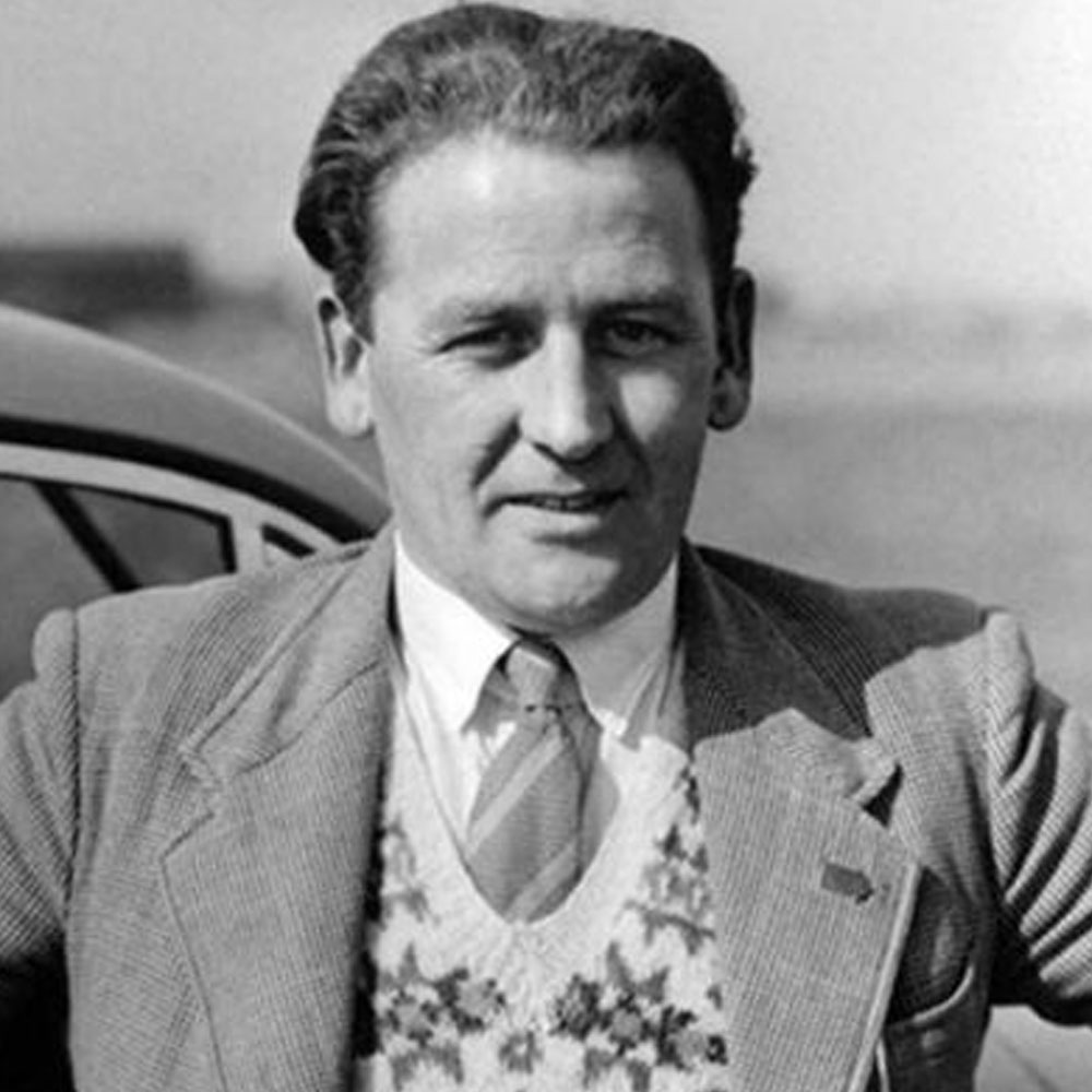 Black and white photo of Norman Dewis