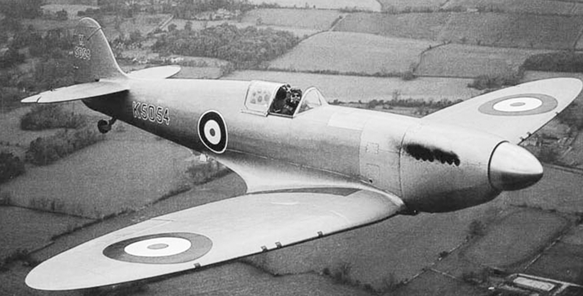 Black and white picture of Spitfire flying