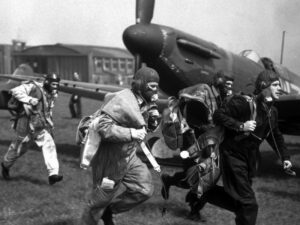 Spitfire pilots running to plane