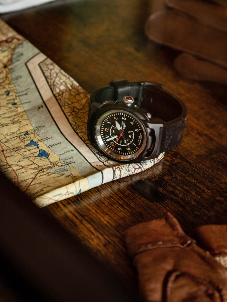S4 blackout watch on black leather strap on map