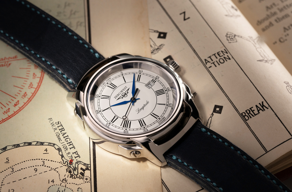 L1 watch on leather strap with blue stitching on a map
