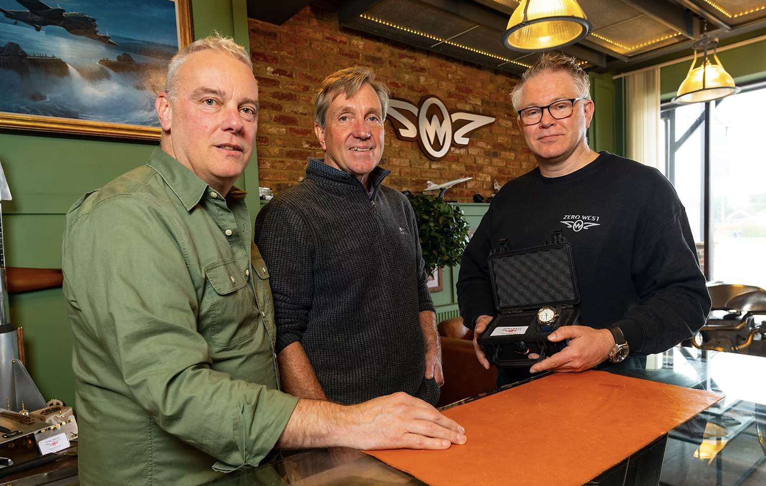 Graham and Andrew giving watch to Simon Curwen