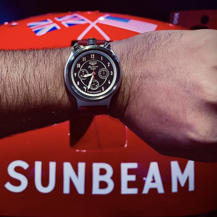 LS-2 wrist shot in front of Sunbeam car