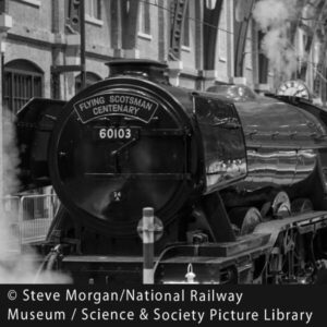 Flying Scotsman at Kings Cross station black and white photo
